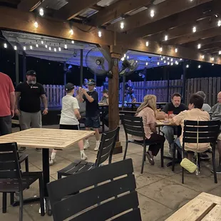a group of people sitting at tables