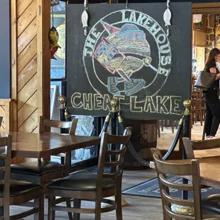 a chalkboard sign in a restaurant