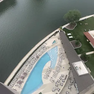 a view of the pool from the balcony