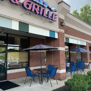 Outside view of restaurant with outside dining tables
