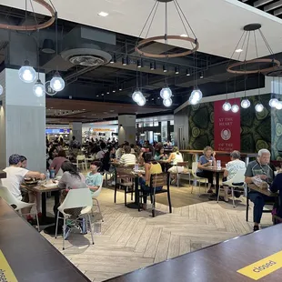 7/7/2021 The dining area in The Lānais dining are is PACKED with diners.