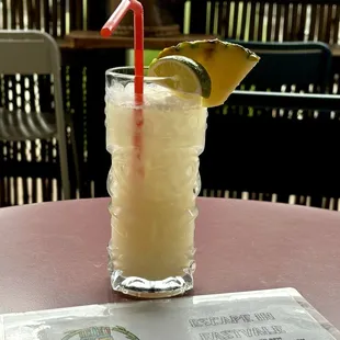 Tropical margarita in a cute tiki cup