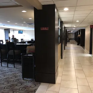The bar is to the left, the restaurant area is down the hall.