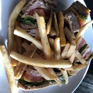 The turkey club sandwich and fries, my choice of side.