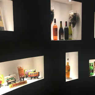 Display of candy and bottles of alcohol.