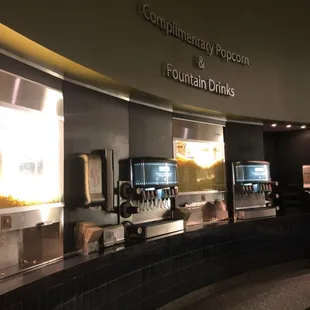 At least 6 stations of free popcorn and drinks.