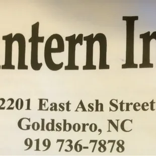 a sign for the lantern inn