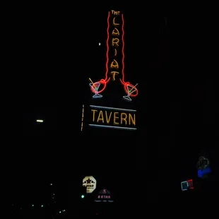 a neon sign in the dark