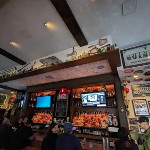 people sitting at the bar