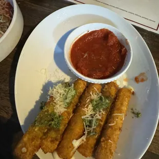 Mozzarella sticks with pesto and Parmesan