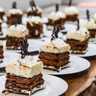 a number of desserts on plates