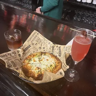 Chicken tikka pizza and cocktails