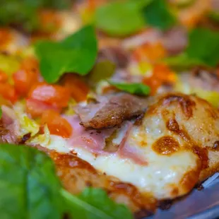 Cubano Pizza features our 14 hour braised pulled pork and house made Cubano sauce!