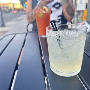a glass of lemonade on a table
