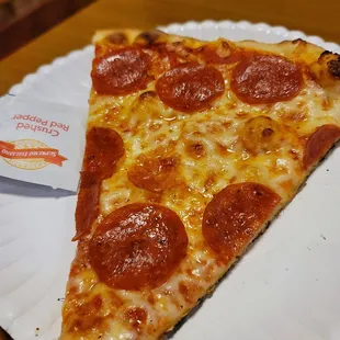 Single slice of pepperoni - $3.52 (with tax)