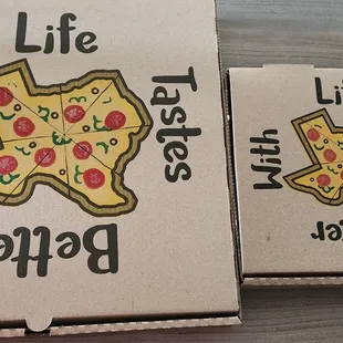 a box of pizza with a slice of pizza on it