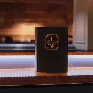 a book on a bar counter
