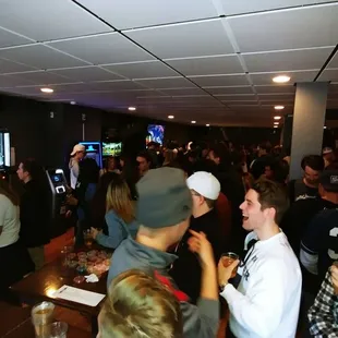 a large group of people playing video games