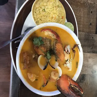 a bowl of seafood and rice