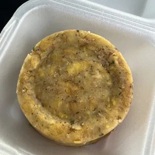 a pie in a styrofoam container