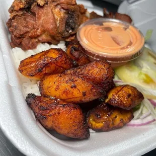 White rice, sweet plantains, fried chicken, salad