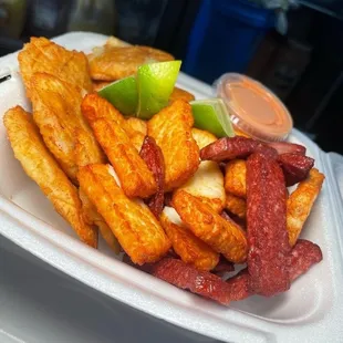1. Pollo, salami, tostones, queso (Chicken, salami, fried plantains, cheese)
