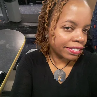 Tasha B.