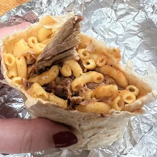 Boarrito. No cheese, sliver of pulled pork, little bit of barbecue sauce. Just awful.