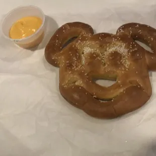 a pretzel with a mickey mouse face on it