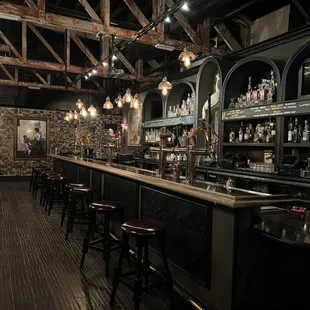 a bar with a lot of stools