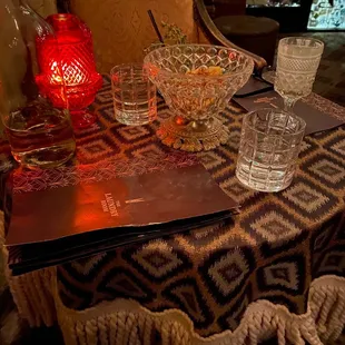 A bowl of popcorn chips and a chair awaits you