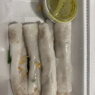 Steam rolls with an exquisite green sauce.