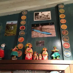 a collection of hawaiian figurines