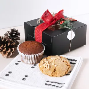 a muffin, a cookie, and a pine cone