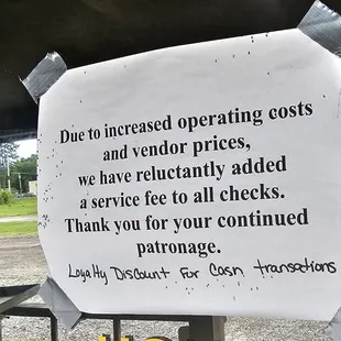 a sign on the side of the road