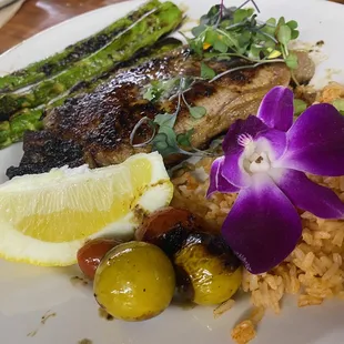 Perfectly seasoned NY Strip, and delicious roasted tomatoes and asparagus.