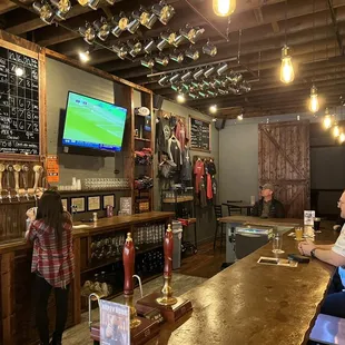 people sitting at the bar