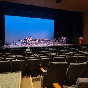 a stage with a band on it