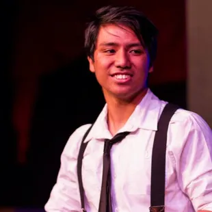 a man in a white shirt and tie