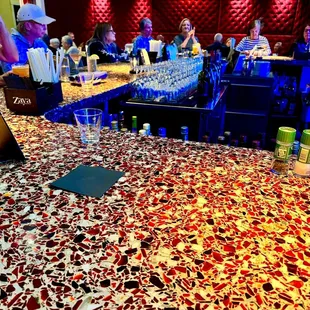 people sitting at the bar