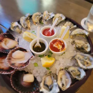 10 Kumamoto, 2 Fanny Bay Oysters. 4 Peruvian Scallops. All amazing. Their House Made Chili Sauce is to die for!