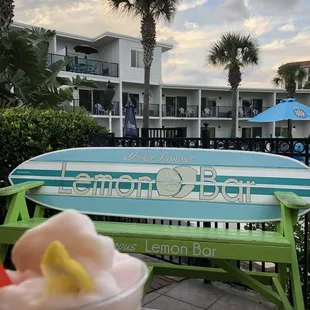 a drink and a surfboard