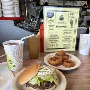 Onion rings. Cheeseburger and coke.