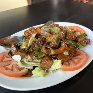 This is the lemon garlic beef. The portion is huge and so flavorful. Chefs kiss.