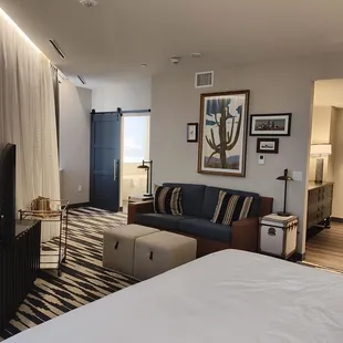 a room with a couch and a bed