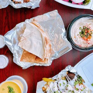 Clockwise: Tahini &amp; cauliflower, falafel plate, hummus &amp; pita, loaded fries + falafel, lentil soup!