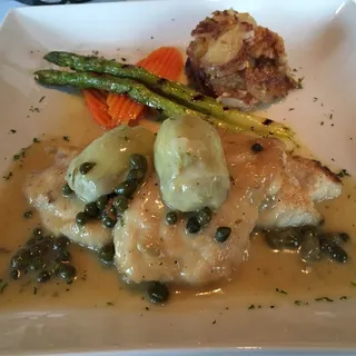 Snapper Evangeline - Sauteed Snapper With Artichoke Hearts And Dressed In A Lemon White Wine Sause With Capers