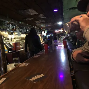  man sitting at a bar