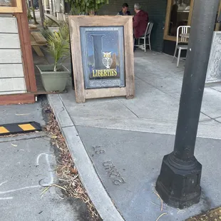 Love a pretty chalk sandwich board