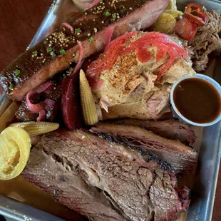 The meats: brisket, chicken, ribs, and pulled pork